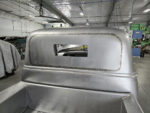 09 Freshly welded and smoothed rear cab panel with a unique window cutout