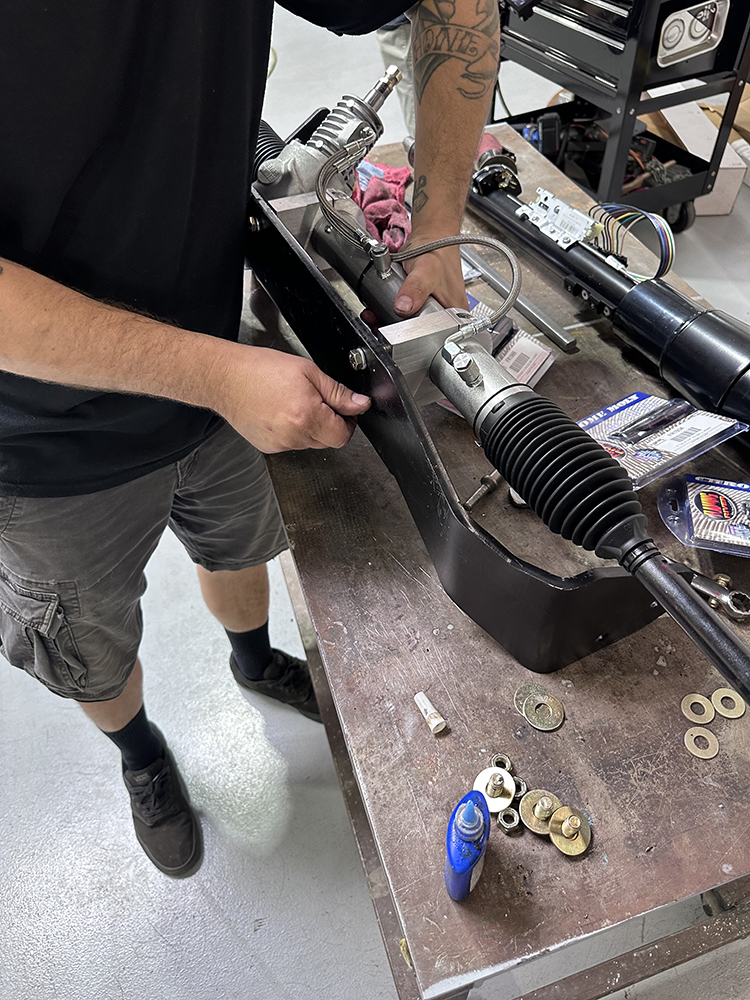 10 Assembling the power rack and pinion system on the workbench before installation