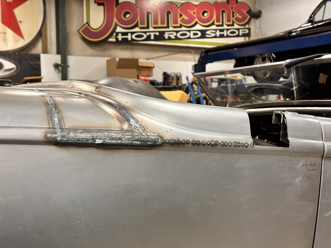 10 Side profile of a 1932 Ford Roadster mid customization at Johnson’s Hot Rod Shop