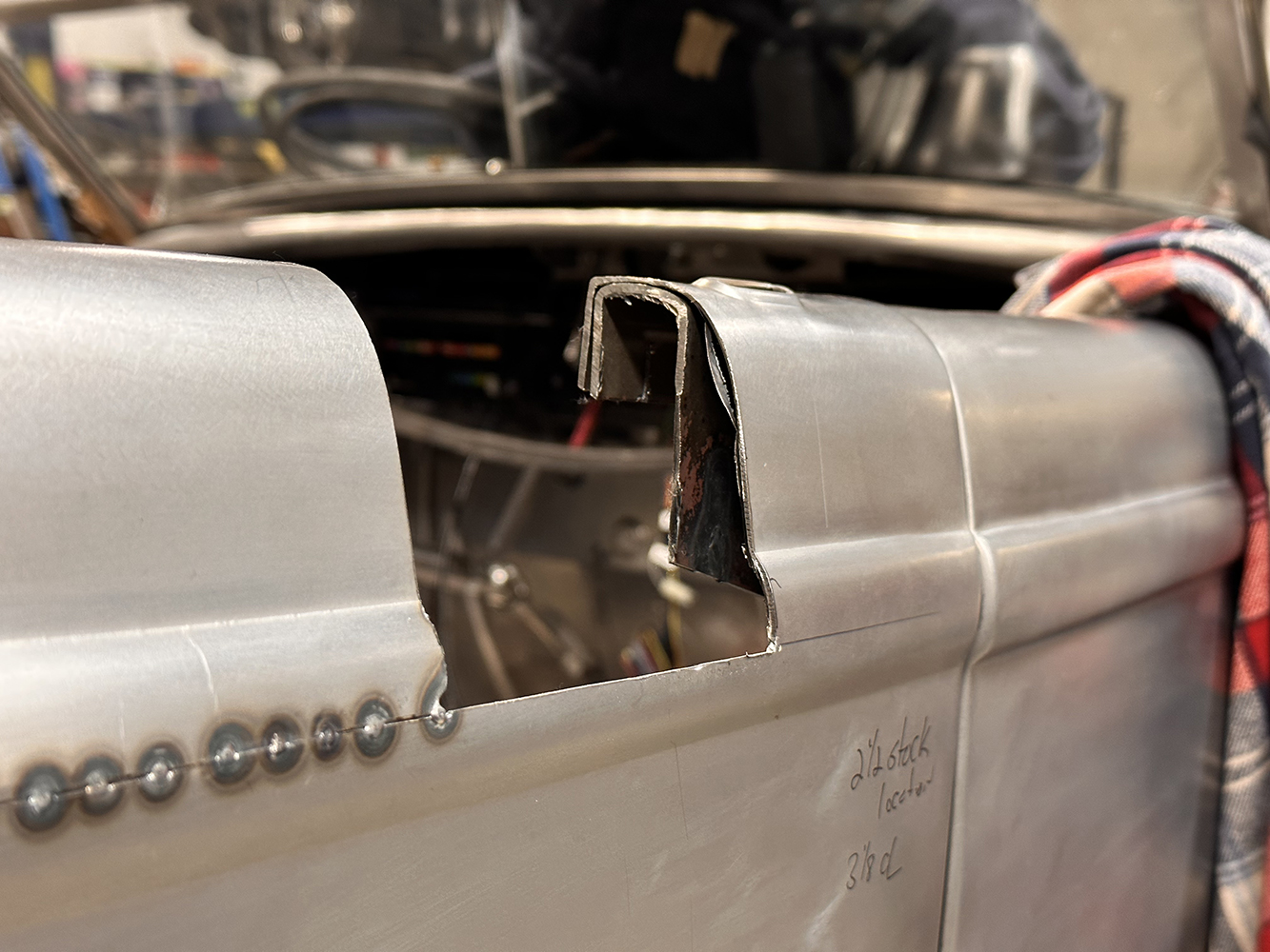 11 A chopped door section on a 1932 Ford Roadster showing fresh metalwork and structural modifications