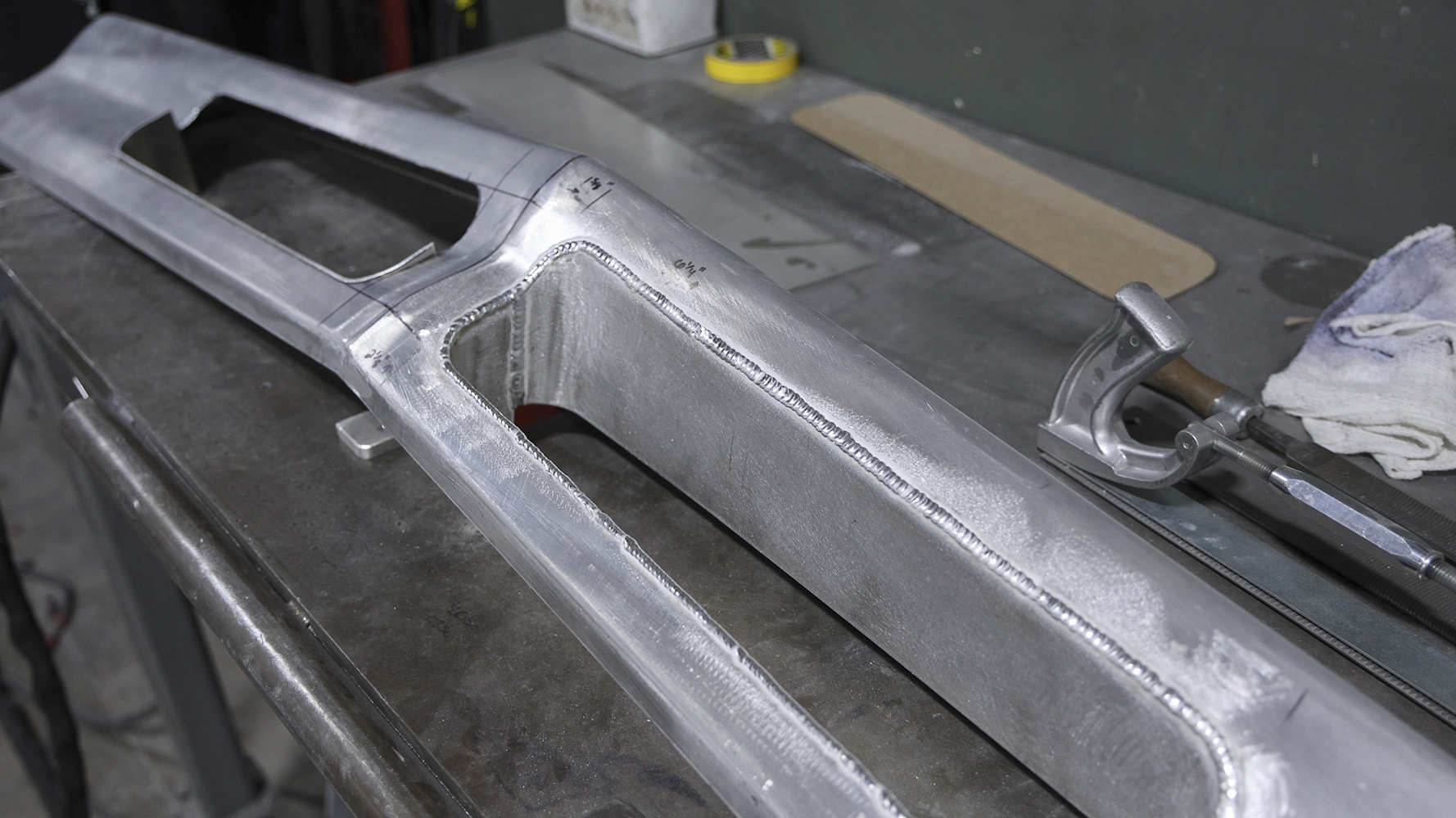 11 A custom fabricated aluminum bumper section for a 1962 Chevy Impala with precise TIG welding