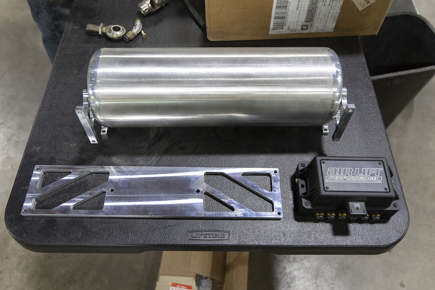 11 Air Lift Performance control module with a FLO billet aluminum tank