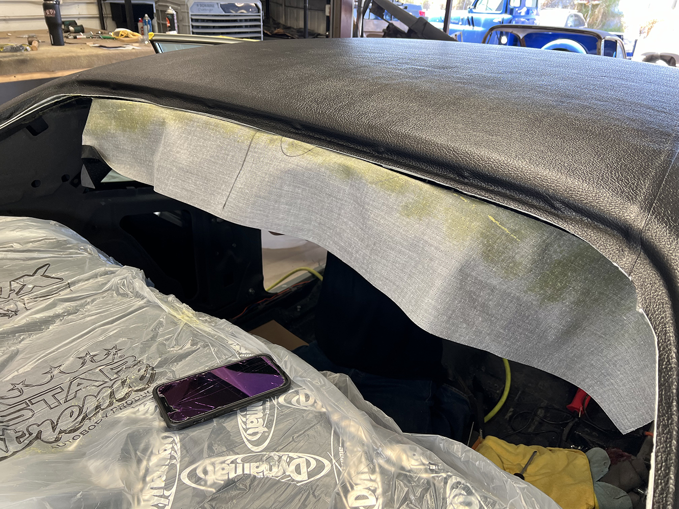 11 Partially installed headliner with exposed edges in a 1970 Chevy Nova