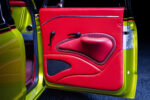 12 1968 Chevrolet C10 fully custom red leather door panel with sculpted armrest and billet handles