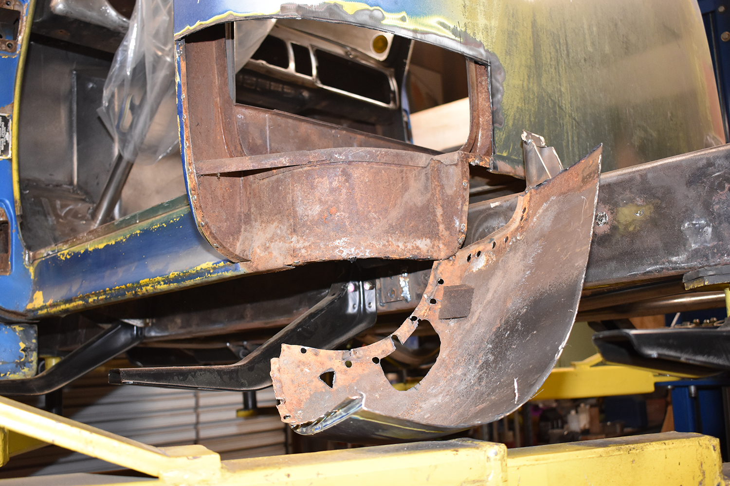 12 A heavily rusted cab corner removed from the truck exposing internal structure