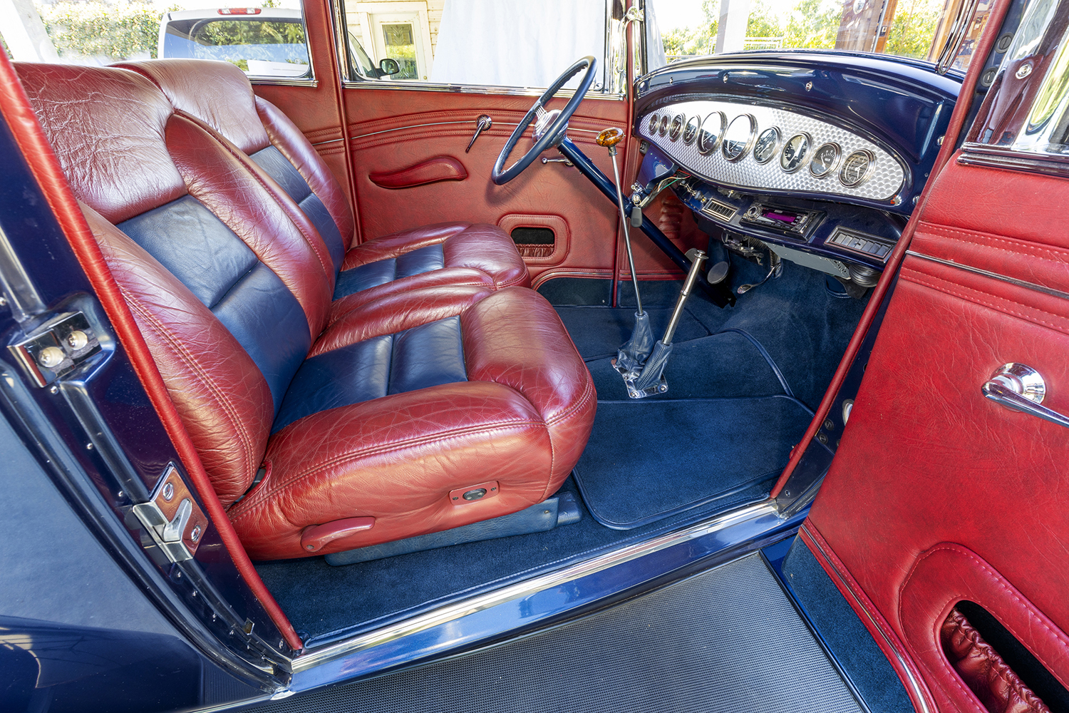 13 1932 Ford Tudor custom red and blue leather interior with bucket seating