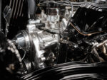 13 1933 Ford Five Window Coupe close up of the chromed and polished accessory drive system