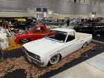 13 1960s Datsun 520 mini truck – White heavily lowered with wire wheels and pinstriping