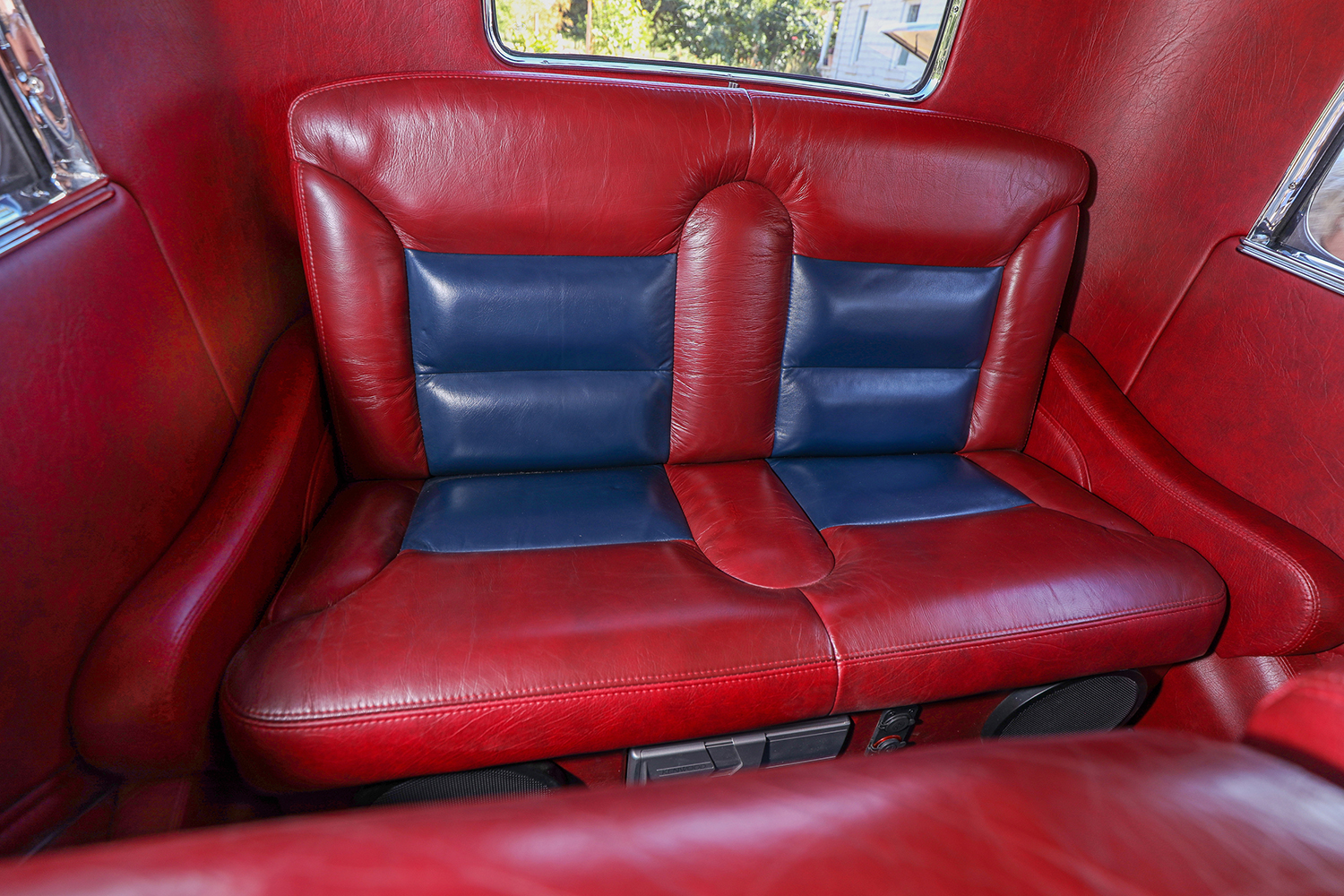 15 1932 Ford Tudor rear seat in matching red and blue leather upholstery