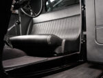 15 1933 Ford Five Window Coupe interior showing a clean simple seating arrangement with vintage inspired upholstery