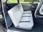 15 1957 Ford Custom interior with classic bench seats lap belts and vintage upholstery