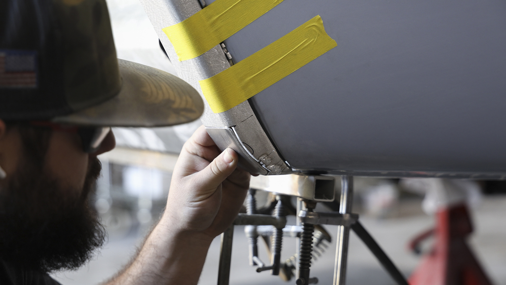15 Close up of a precisely fitted lower rear panel patch on a 1962 Chevy Impala