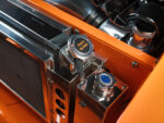 16 1957 Chevrolet Bel Air close up of a custom aluminum radiator and polished overflow tank by Triolo’s Hot Rods