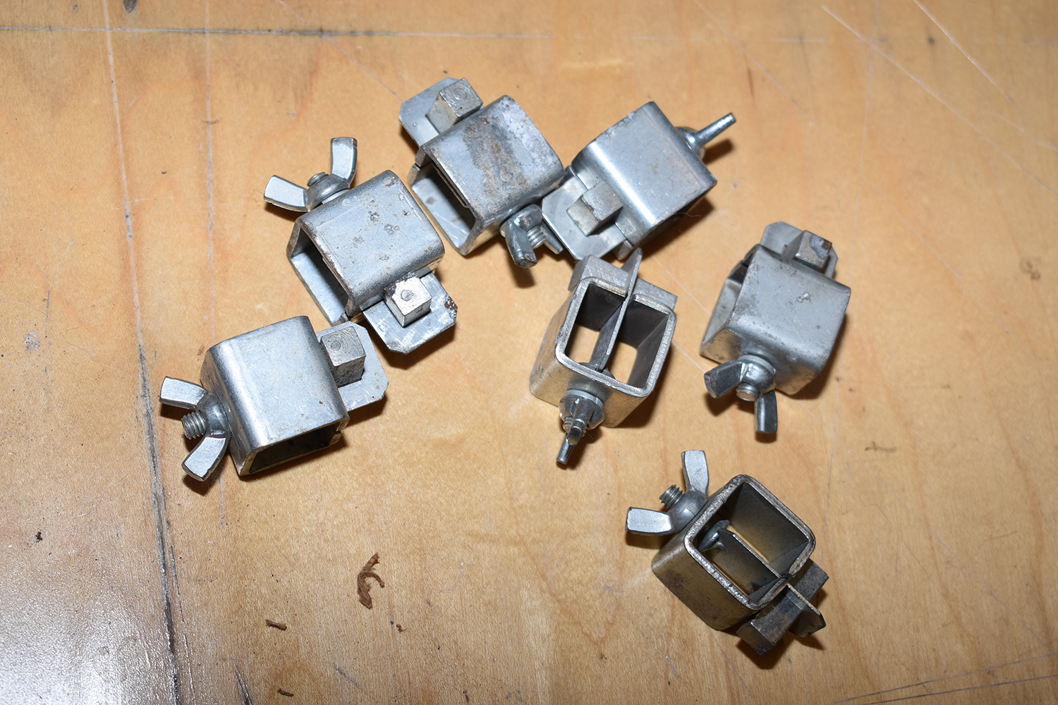 16 A set of panel clamps used for aligning and securing patch panels