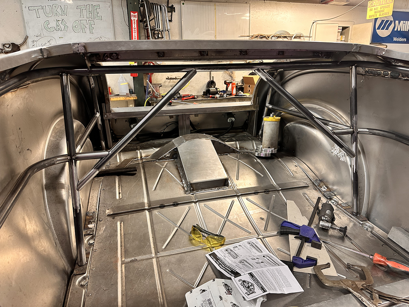 16 Rear chassis bracing inside a 1932 Ford Roadster featuring custom tubing and panel reinforcement