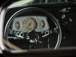 17 1933 Ford Five Window Coupe steering wheel and dash view with a vintage style speedometer and modern billet touches
