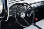 17 1957 Ford Custom steering wheel with a speedometer spanning the dash and a classic design