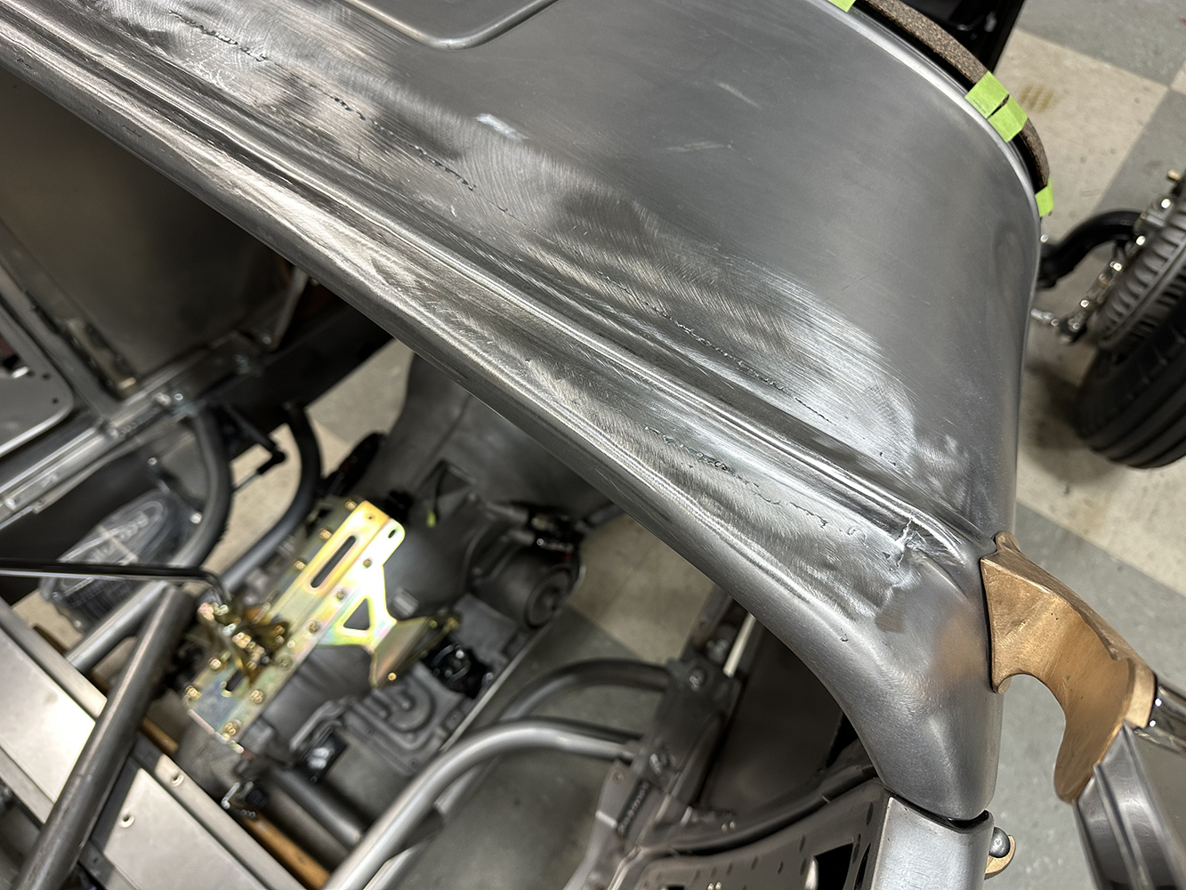 17 Close up of a 1932 Ford Roadster’s body seam shaped and smoothed for a seamless finish