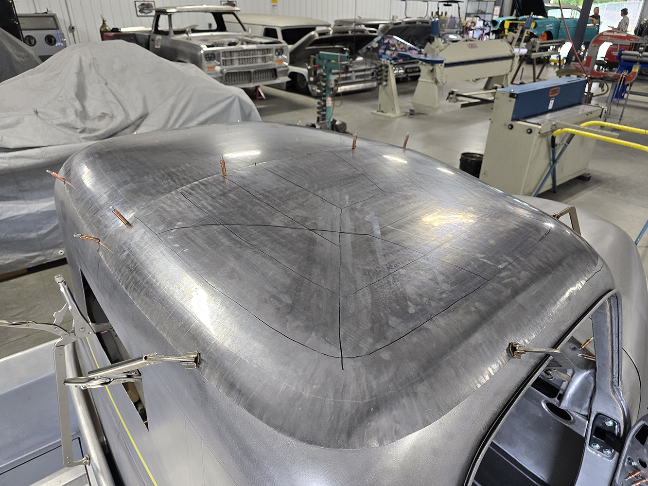 17 Roof skin with precise hammer formed sections aligned with the cab