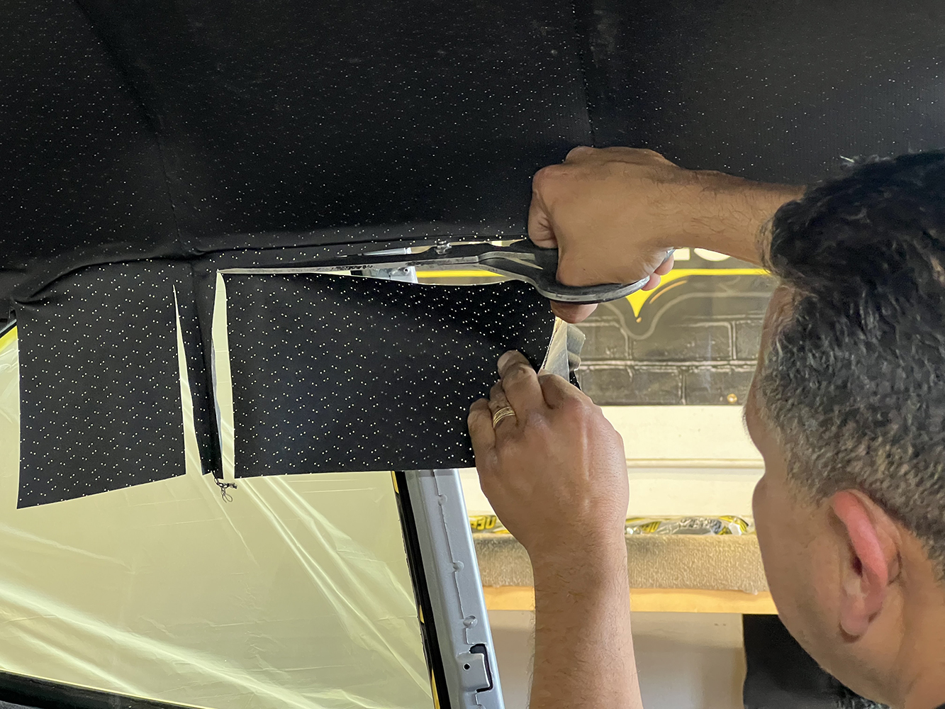17 Trimming and adjusting the rear window area of the headliner in a 1970 Chevy Nova