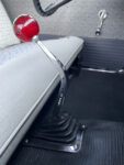 18 1957 Ford Custom floor shifter with a red glitter ball knob and rubber boot