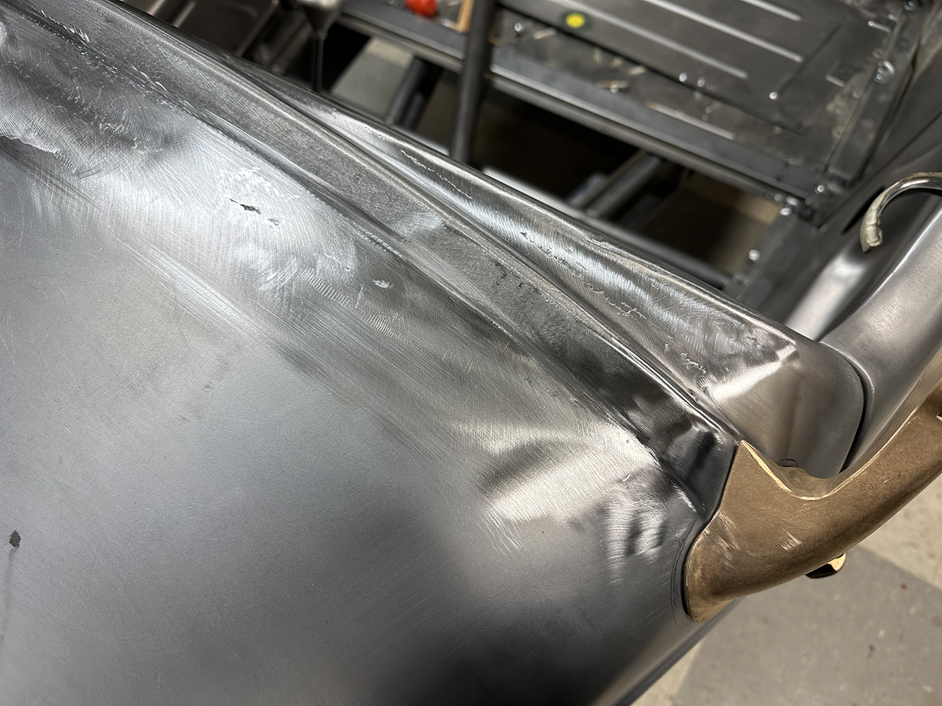 18 Another angle of a 1932 Ford Roadster’s rear panel showing refined metal shaping and finishing