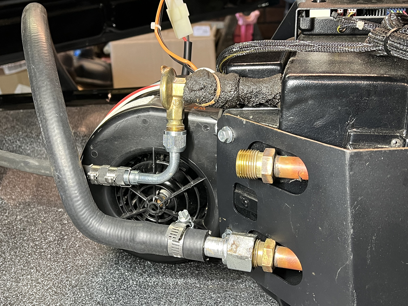 18 Close up of Vintage Air evaporator fittings with refrigerant hoses brass fittings and electrical connectors