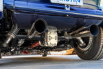 19 1932 Ford Tudor rear end showing polished exhaust tips and quick change differential