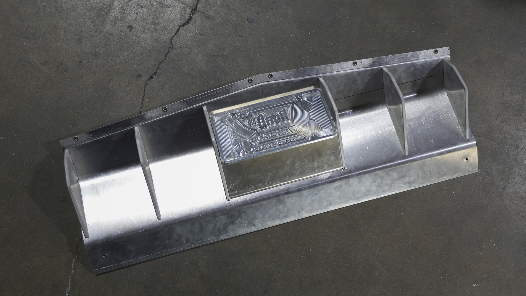 19 A fully machined and engraved rear aluminum diffuser for a 1962 Chevy Impala