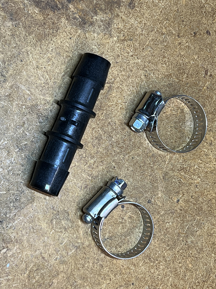 19 Plastic hose splice connector with two metal hose clamps for securing heater or AC lines
