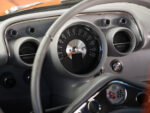 22 1957 Chevrolet Bel Air close up of the restored gauge cluster with vintage speedometer and auxiliary gauges