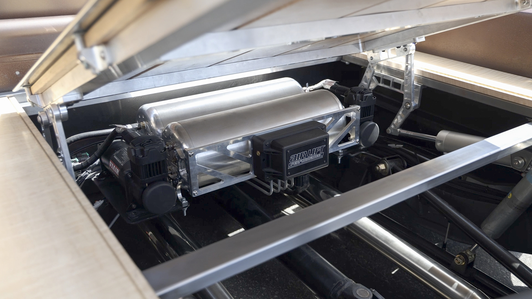 26 Completed air suspension system neatly mounted under the wood truck bed