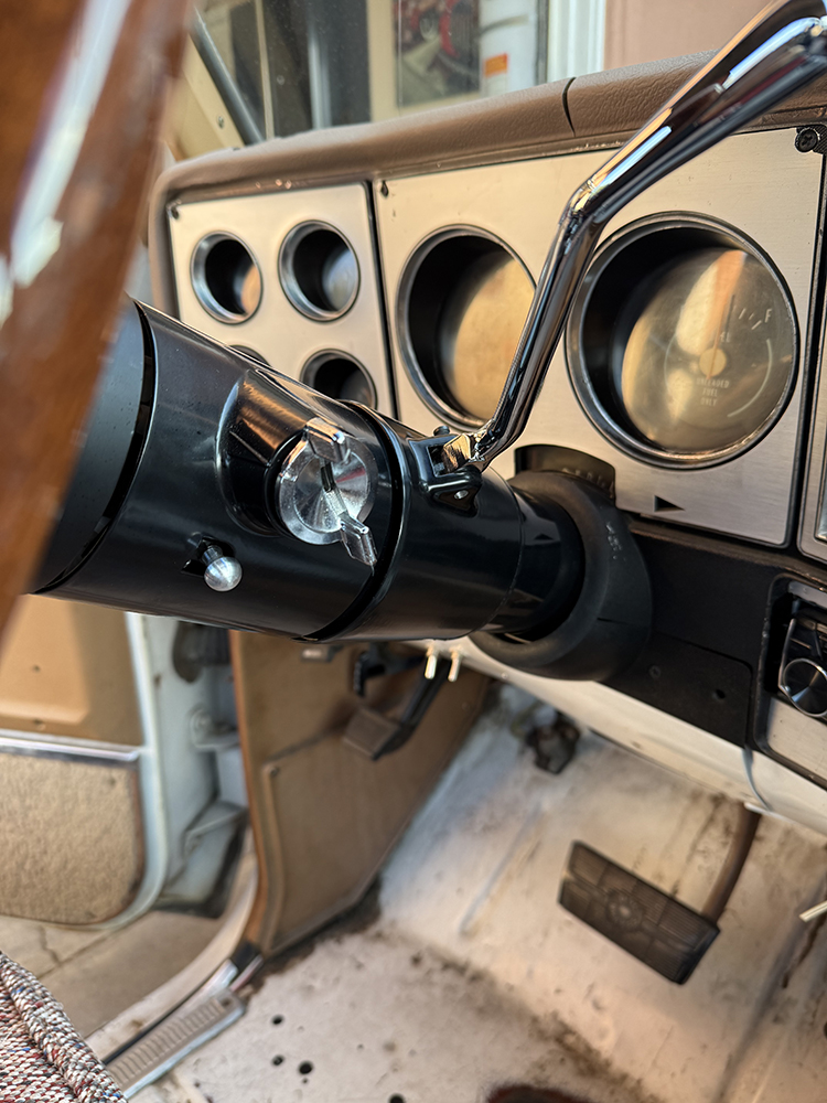 26 Completed steering column installation with a sleek black finish and chrome shift lever