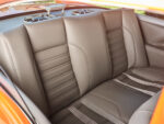 27 1957 Chevrolet Bel Air rear seat with matching custom leather upholstery and integrated seat belts
