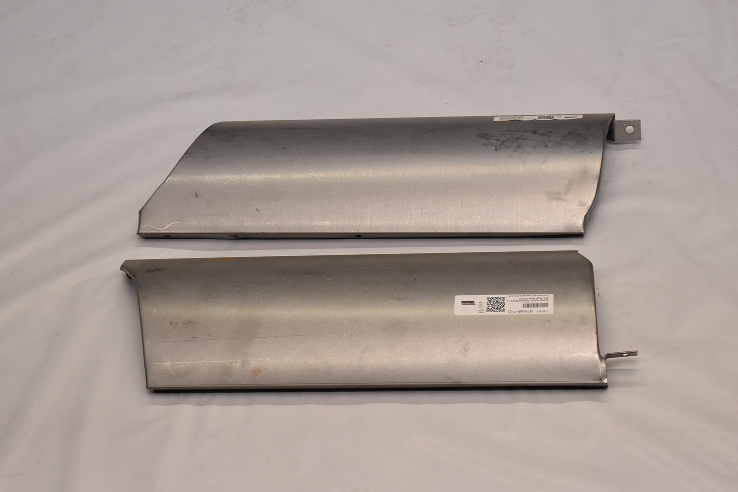 27 Pair of stamped steel rocker panel repair sections ready for installation
