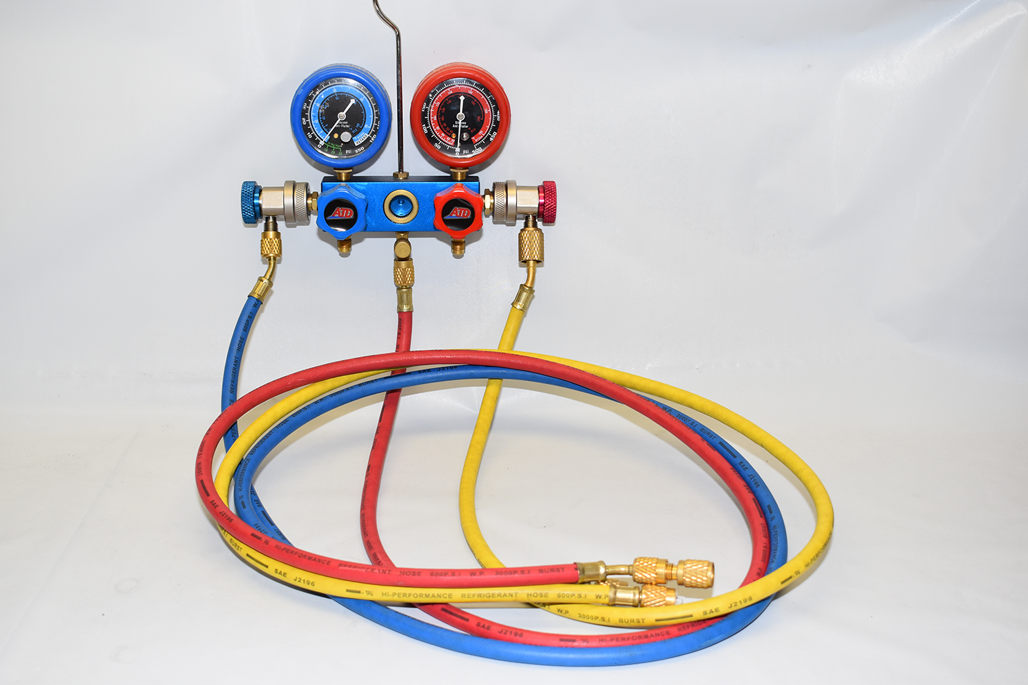 36 manifold gauge set with red blue and yellow hoses for diagnosing and servicing AC systems