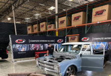 00 Restored Chevrolet C10 receiving full TMI interior upgrade in a workshop setting