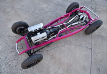 01 1932 Ford Roadster chassis with a custom pink frame polished V8 engine and performance suspension components