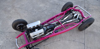 01 1932 Ford Roadster chassis with a custom pink frame polished V8 engine and performance suspension components