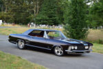02 1963 Buick Riviera front end with quad headlights sharp grille and sleek body lines