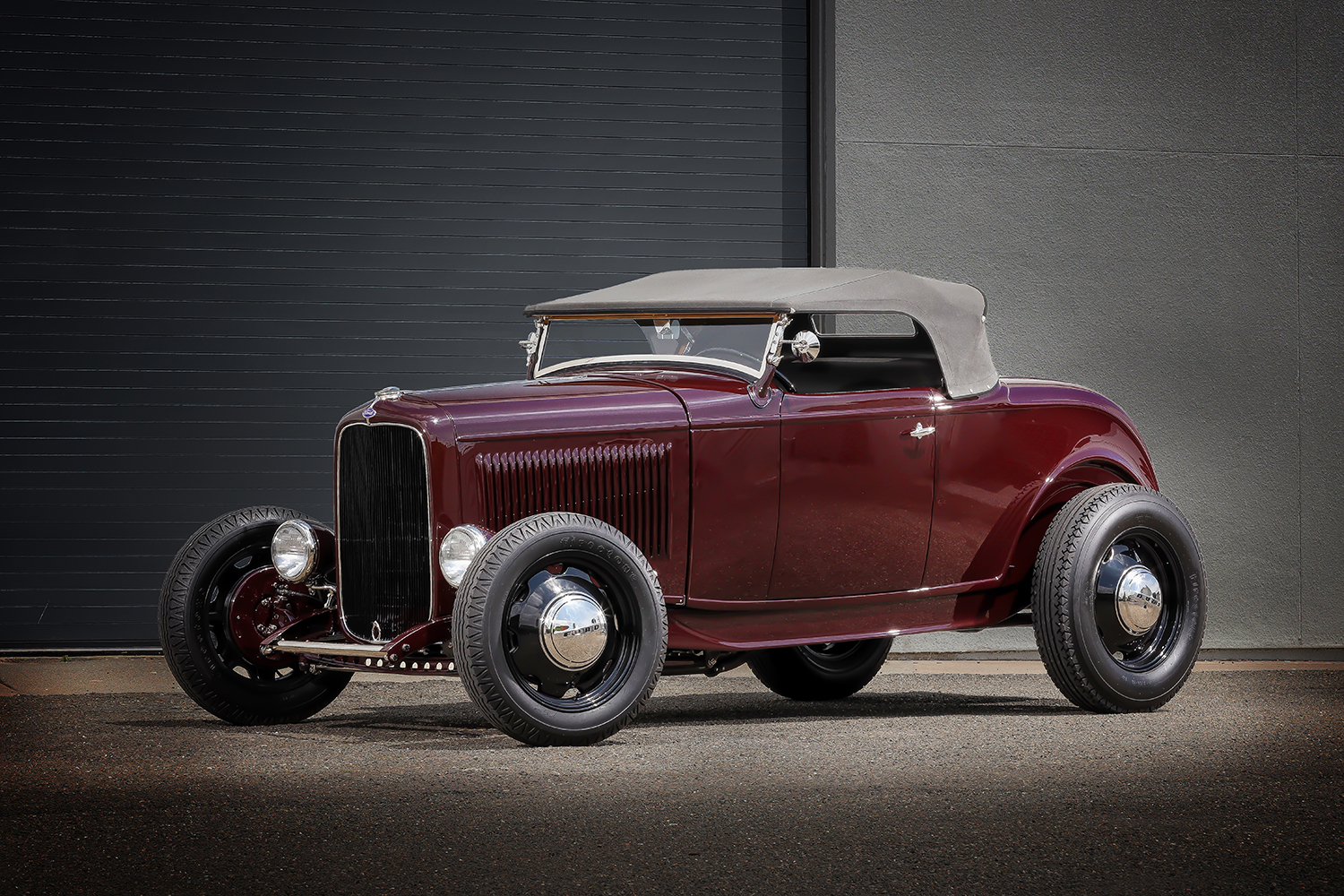 03 1932 Ford Roadster three quarter front view with a chopped windshield and classic grille