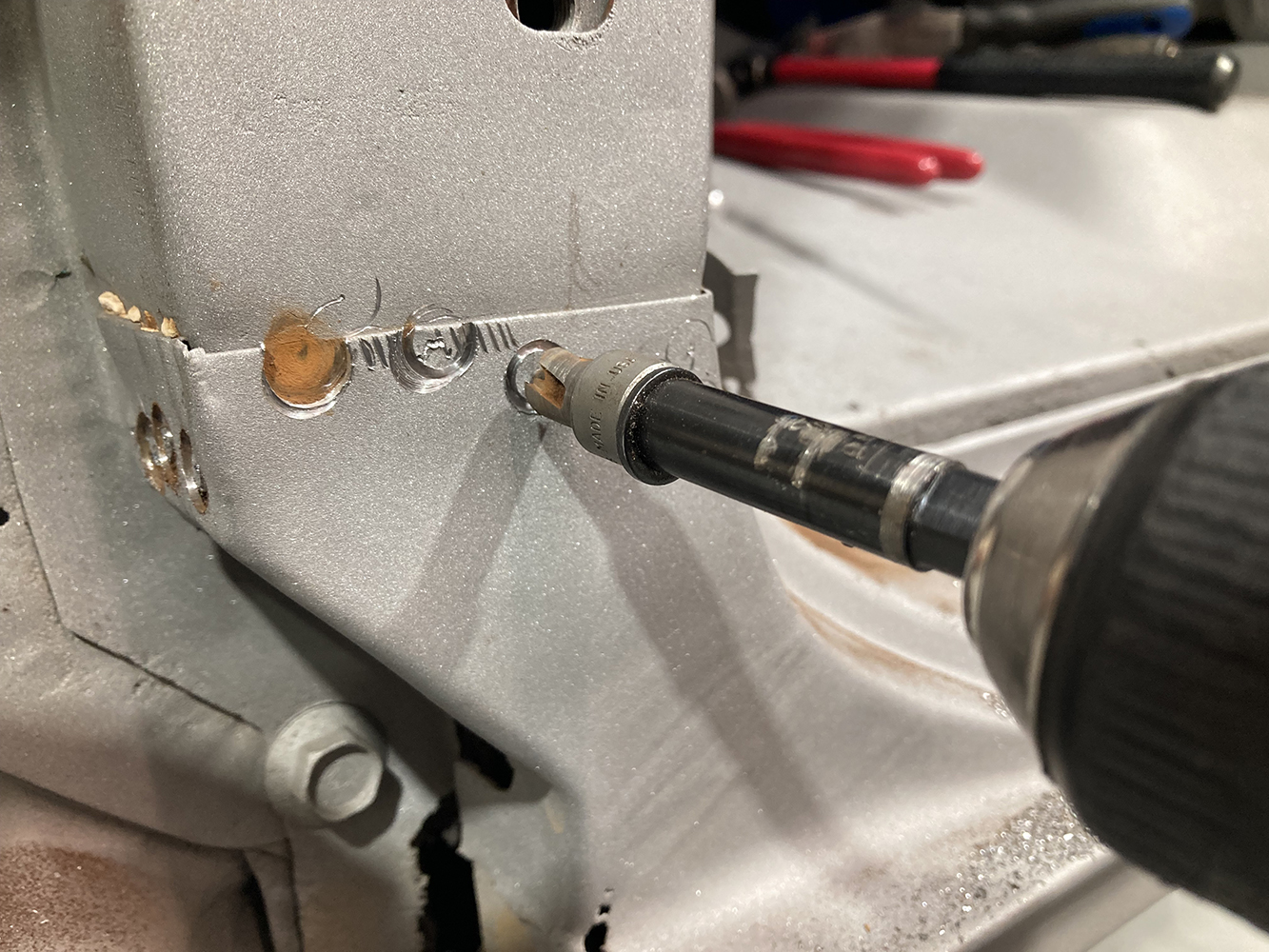 03 Spot welds being drilled out to remove the damaged rocker panel