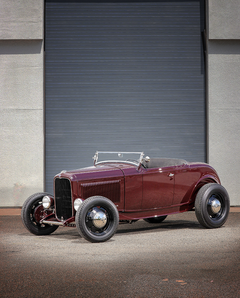 04 1932 Ford Roadster in a topless highboy configuration showcasing its sleek body lines and louvered hood