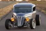 04 1935 Chevy Coupe head on aggressive stance vertical grille classic street rod look 1