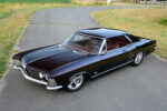 04 1963 Buick Riviera rear view with classic taillights chrome bumper and clean trunk line