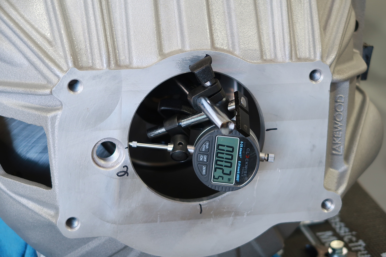 04 Dial indicator checks bellhousing alignment for precise fitment