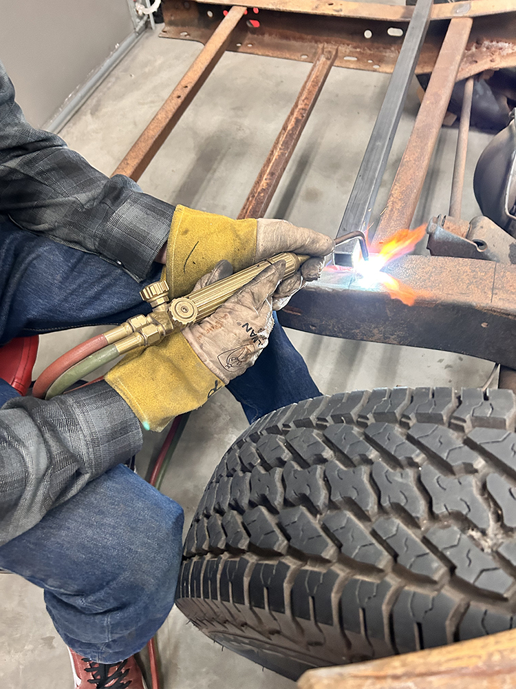 04 Welding reinforcements onto the frame to strengthen structural integrity