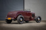 06 1932 Ford Roadster rear view without a top featuring a classic trunk and chrome tail lights