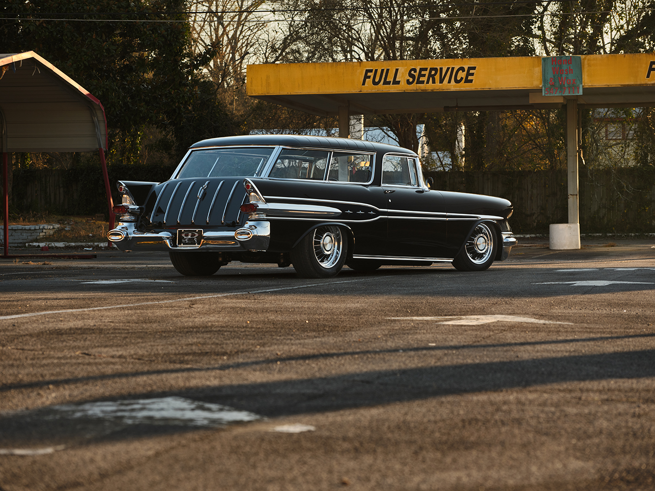 07 1957 Pontiac Safari wagon rear three quarter view dual exhaust finned bumper classic design