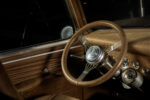 09 1952 Chevrolet 3100 cabin with a minimalist suede wrapped dash and polished metal trim